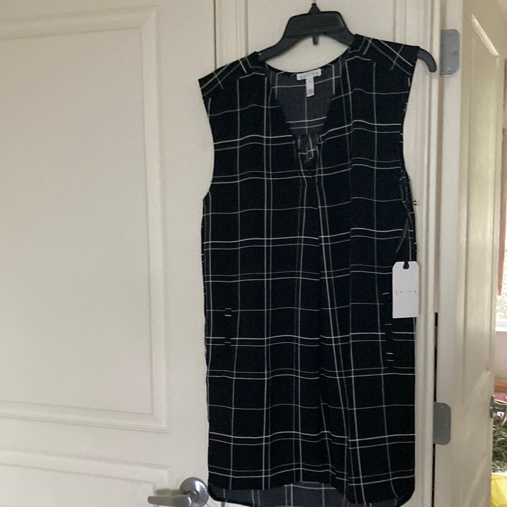 Brand new Nordstrom brand dress. Size Small. New with tags. Black pin strip